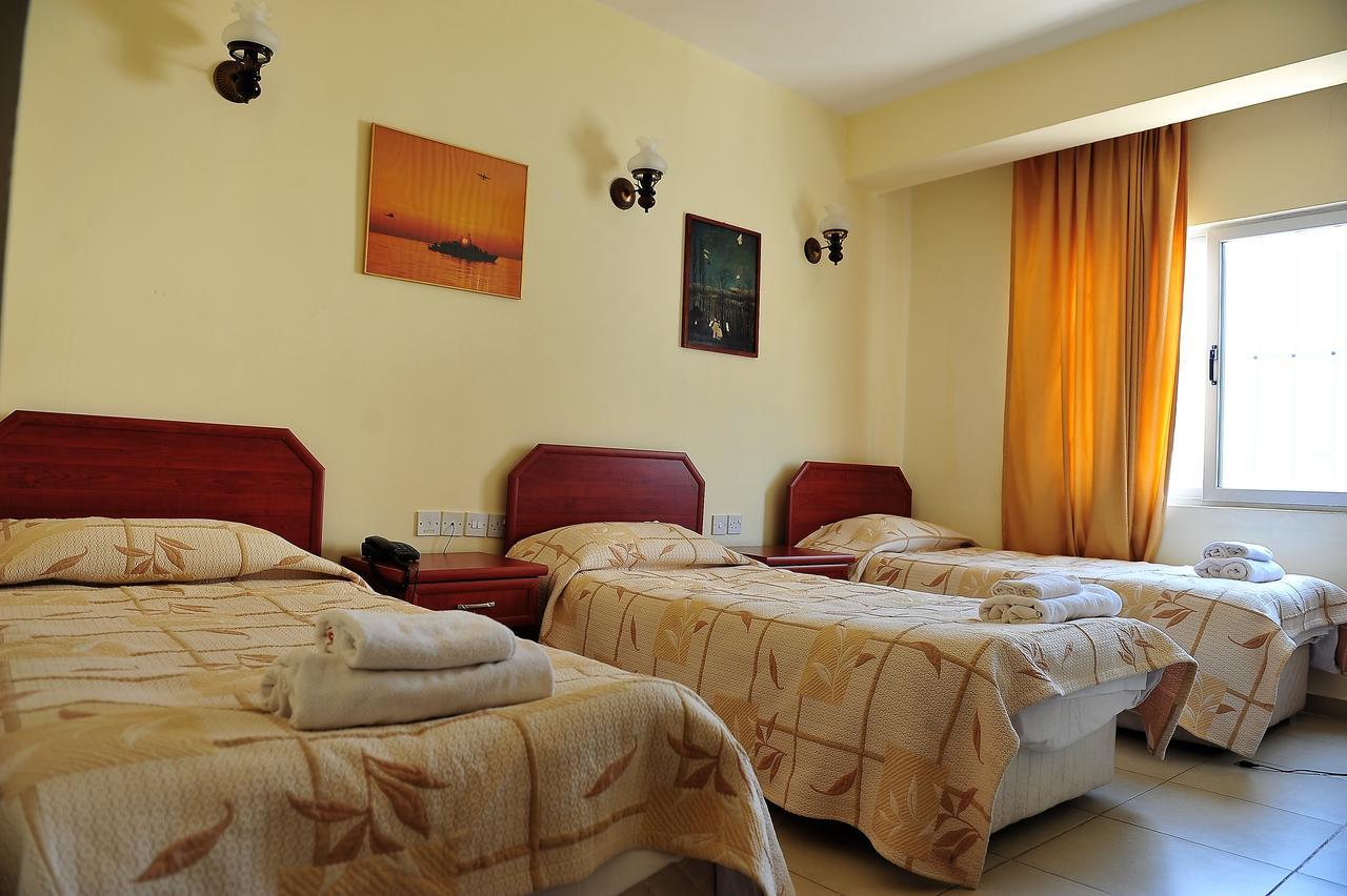Kasgar Court Hotel Agia Varvara Bagian luar foto